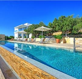 5 bedroom luxury villa with infinity pool, sea views and tennis court near Chania, sleeps 10